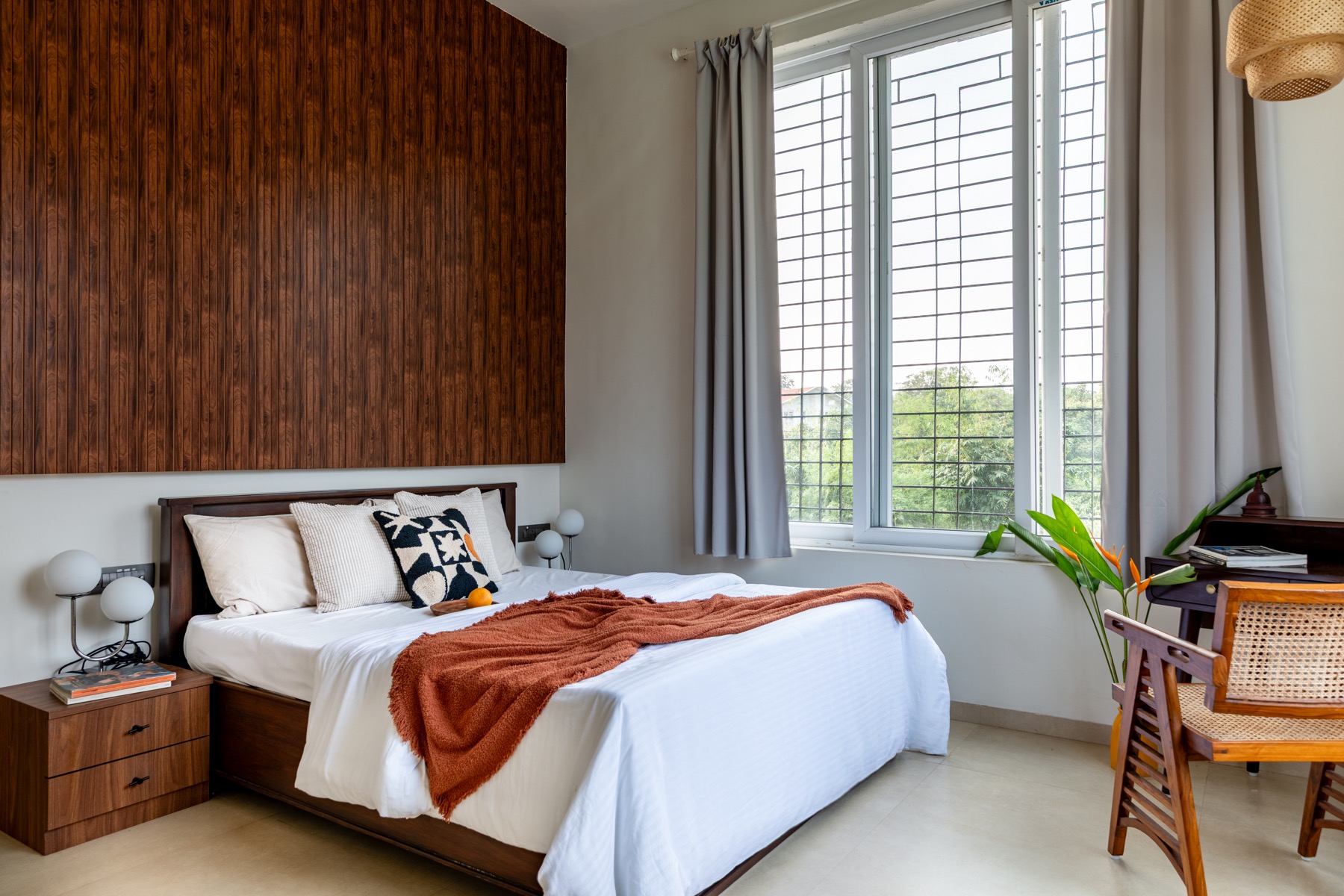 Rust-accented spacious private room at 7 Farms Karjat
